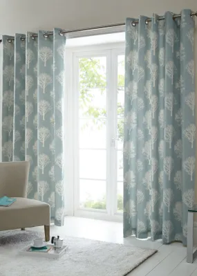 Fusion Woodland Trees Blue Eyelet Curtains